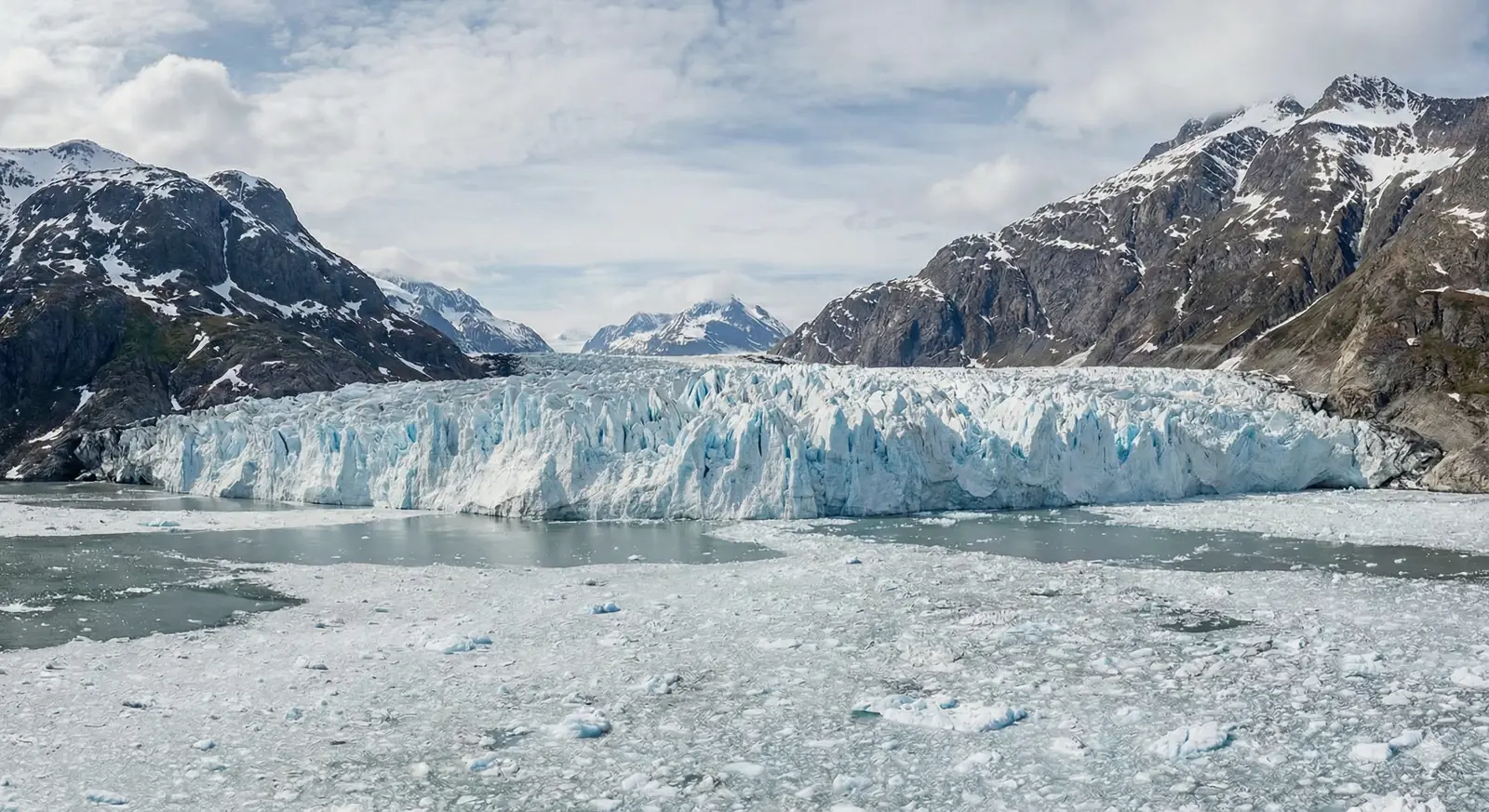 (a) Then: illustration of a tidewater glacier whose ice cliff meets a fjord of floating ice between snow-streaked mountains.